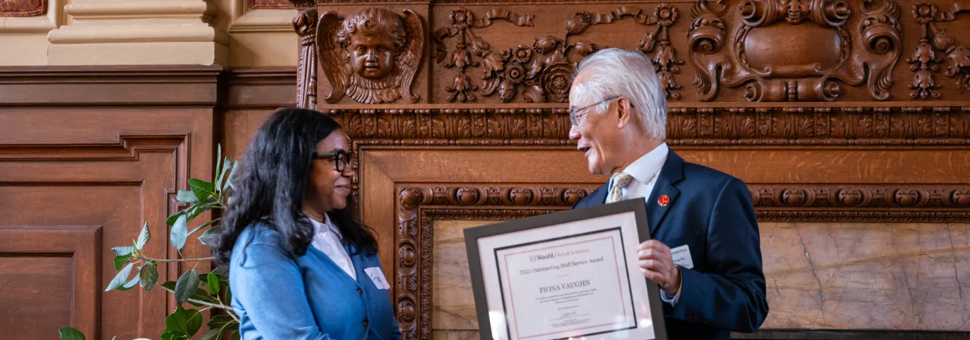 Arts & Sciences Dean Feng Sheng Hu presents Fiona Vaughn with the 2025 Outstanding Staff Service Award