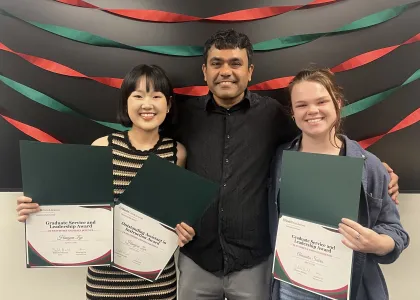 Debashis Mondal with his two advisee awardees, Alexandra Sabrio and Hangcen Zou