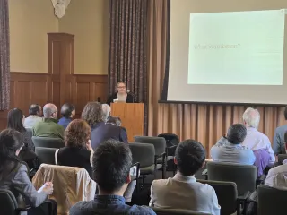 Catherine Calder speaks in Duncker Hall