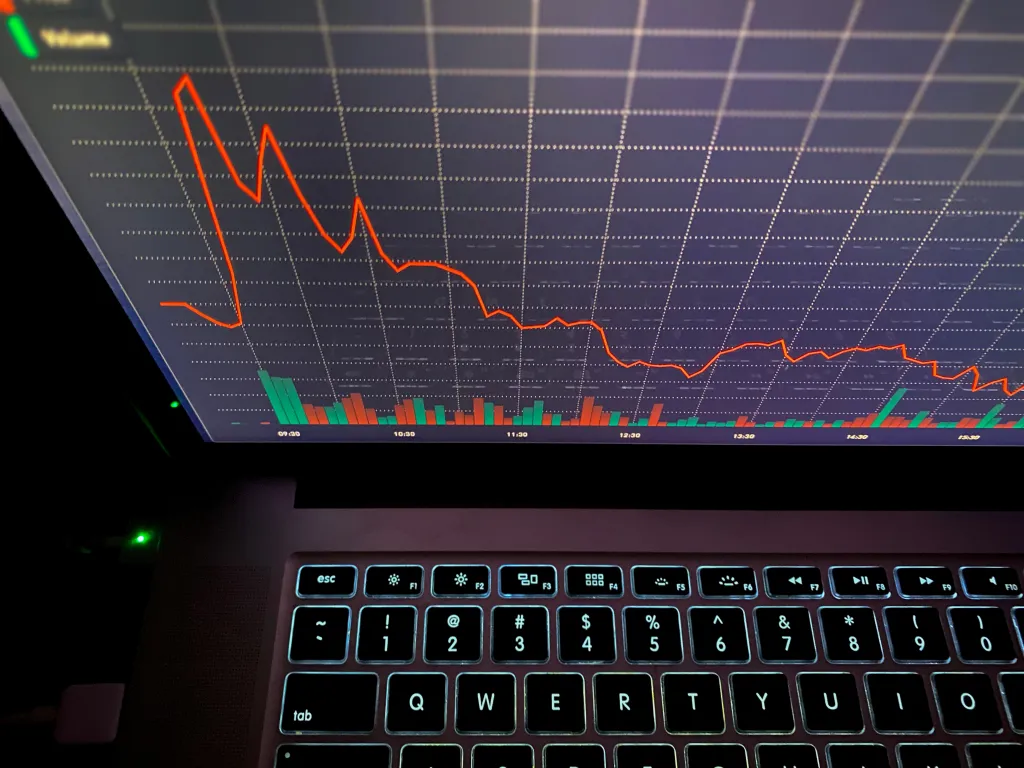 image of laptop with data on screen